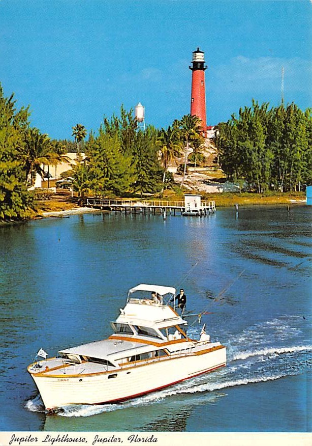 Deep-sea fishing boat passing Jupiter Lighthouse Jupiter, Florida USA  Postcard