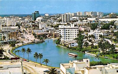 This is an aerial view of famed Lake Pancoast Miami Beach, Florida Postcard