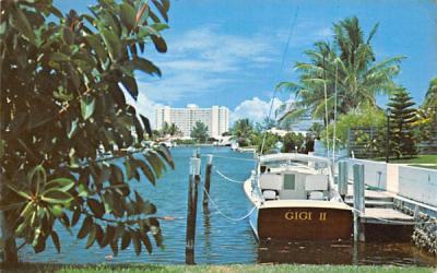 Waterway and apartments in the background Pompano Beach, Florida Postcard