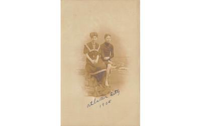 Photo of two peoope sitting on a rock at the beach Atlantic City, New Jersey Postcard