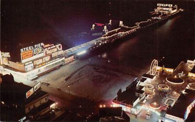 World famous Steel Pier photographed at night Atlantic City, New Jersey Postcard