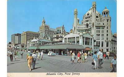 Boardwalk, strollers, rolling chair and luxury hotels Atlantic City, New Jersey Postcard