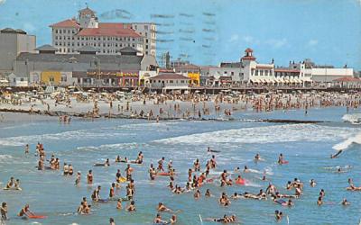 ocean surf, bathers in front of beach and skyline Ocean City, New Jersey Postcard