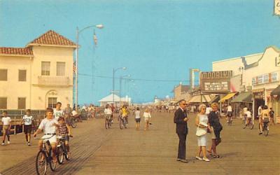 Bicycling and strolling on the boardwalk Ocean City, New Jersey Postcard